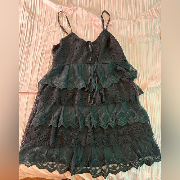 Black frilled part dress. - Picture 3 of 3